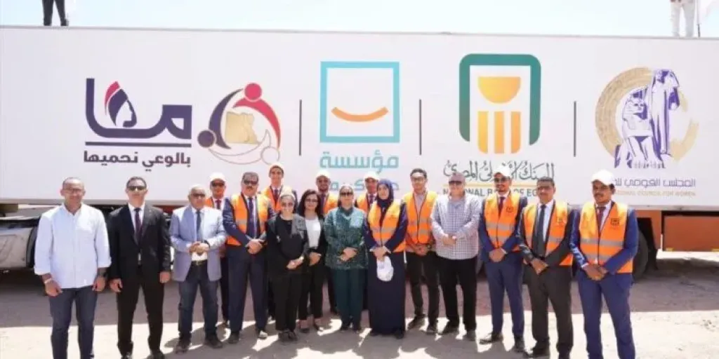 البنك الأهلي المصري يشارك في توزيع 20,000 كرتونة مواد غذائية